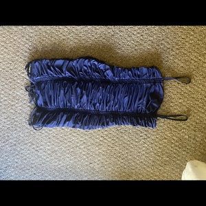 Rushed dress with ties on bottom